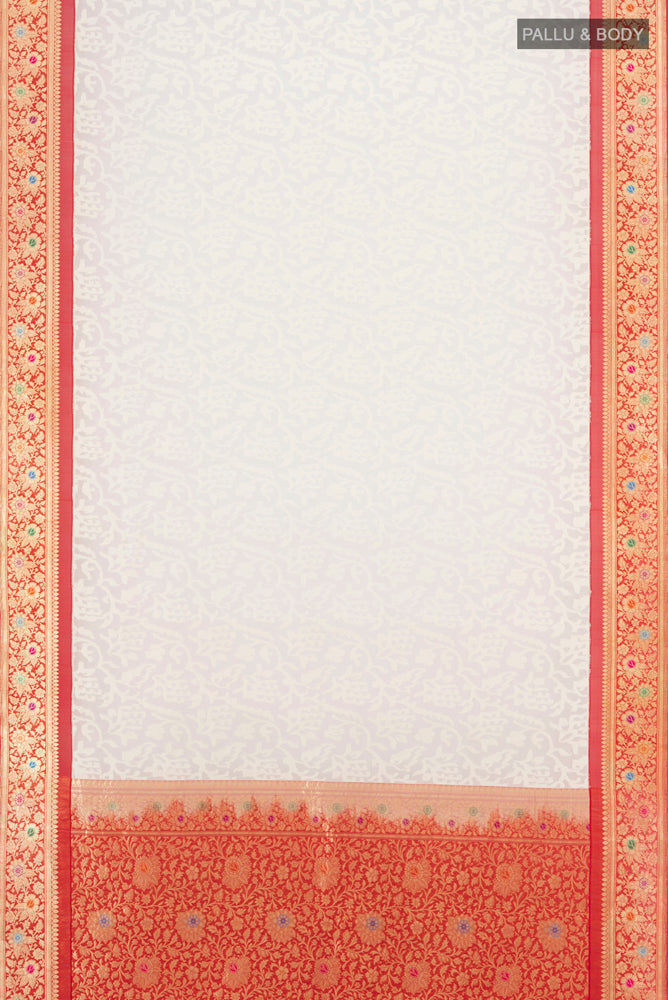 Flat view of Cream Banarasi Kora Silk Saree with Zari Butta on the body and Silk Border. 