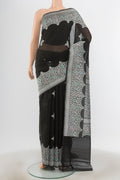 Black Banarasi Katan Silk Saree with Zari Butta on the body and Silk Border.  displayed on a mannequin