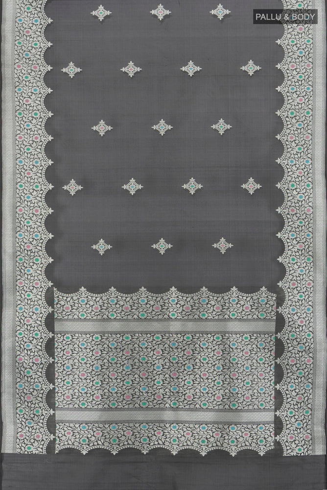 Flat view of Black Banarasi Katan Silk Saree with Zari Butta on the body and Silk Border. 