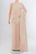 Peach Banarasi Kota Silk Saree with Zari Butta on the body and Silk Border.  displayed on a mannequin
