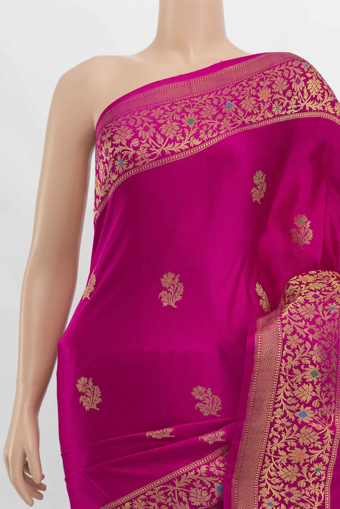 Border image of Magenta Banarasi Silk Saree with Zari Butta on the body and Zari Border. 