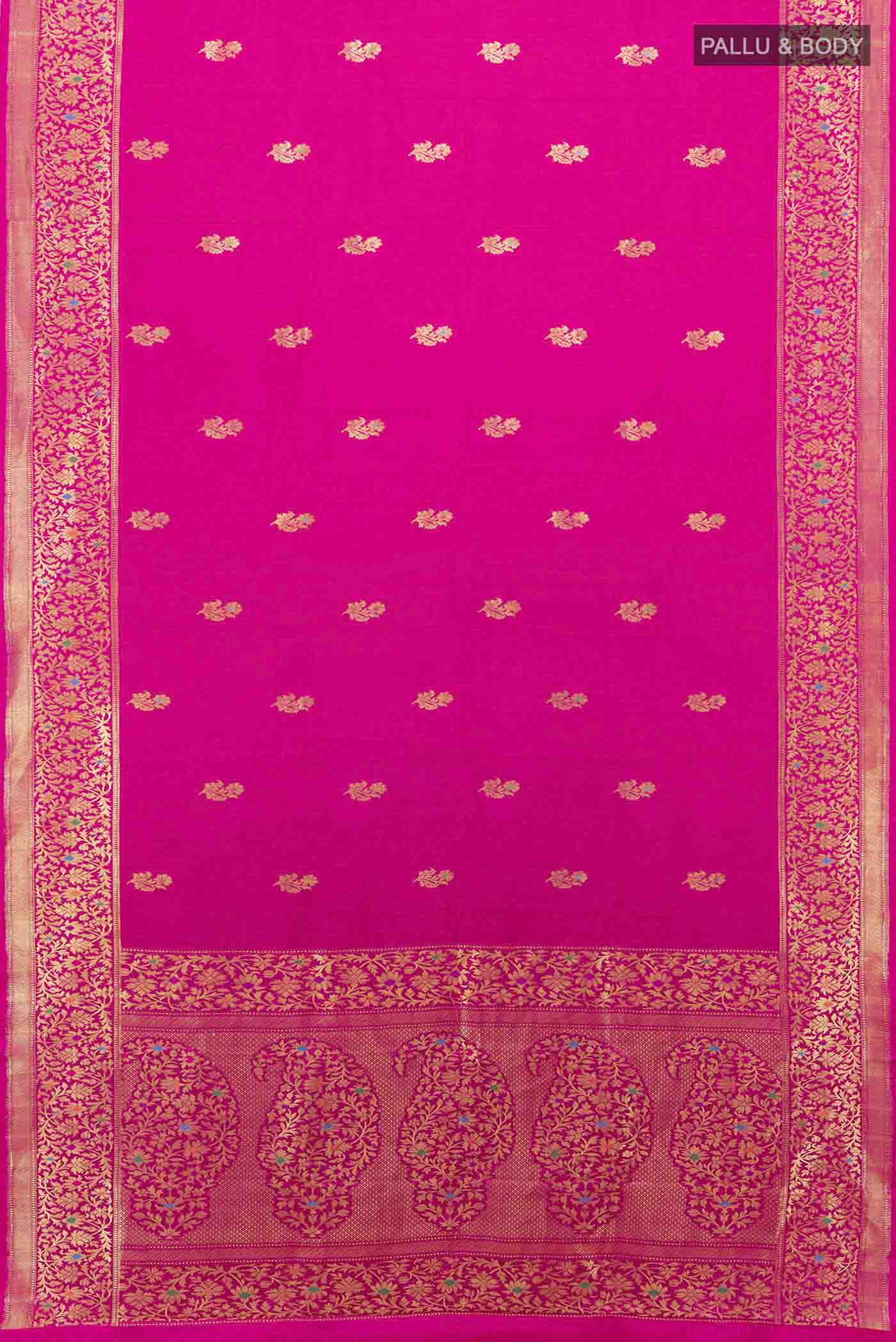 Flat view of Magenta Banarasi Silk Saree with Zari Butta on the body and Zari Border. 