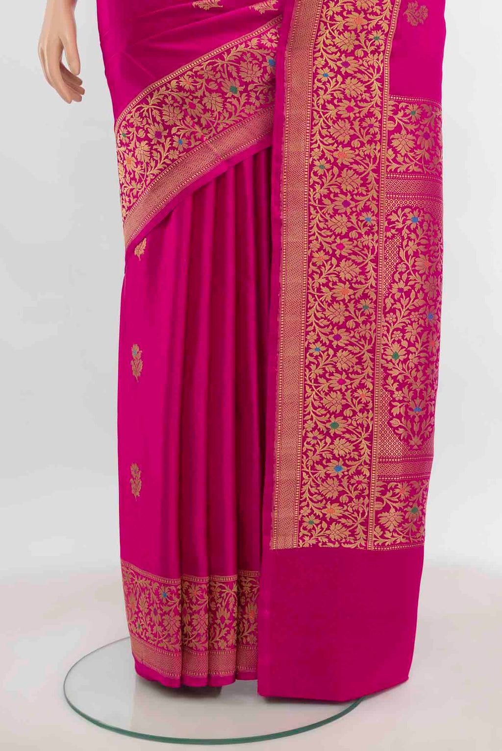 Pleats and pallu of Magenta Banarasi Silk Saree with Zari Butta on the body and Zari Border. 