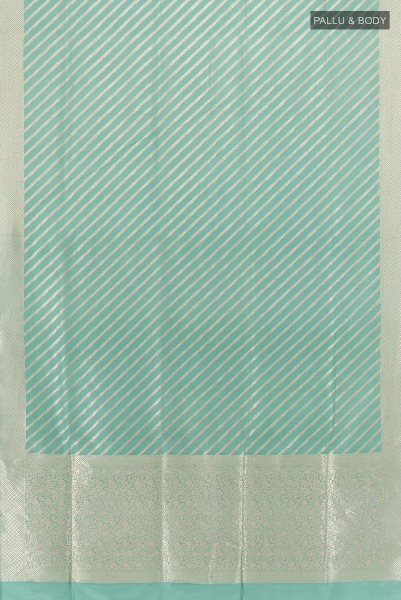 Flat view of Light Blue Banarasi Silk Saree with Stripes on the body and Zari Border. 