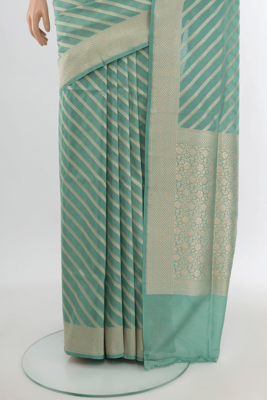 Pleats and pallu of Light Blue Banarasi Silk Saree with Stripes on the body and Zari Border. 