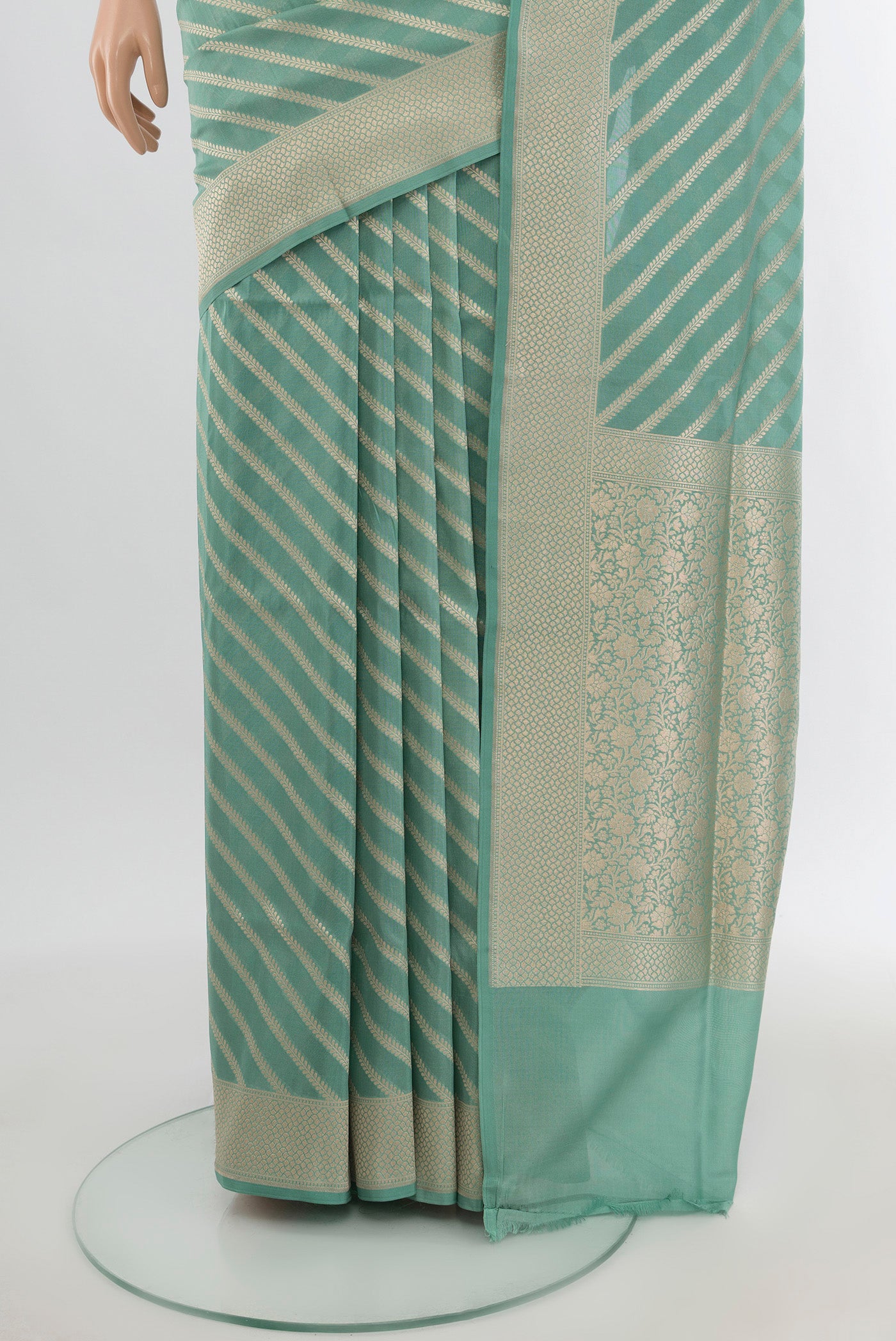 Pleats and pallu of Light Blue Banarasi Silk Saree with Stripes on the body and Zari Border. 