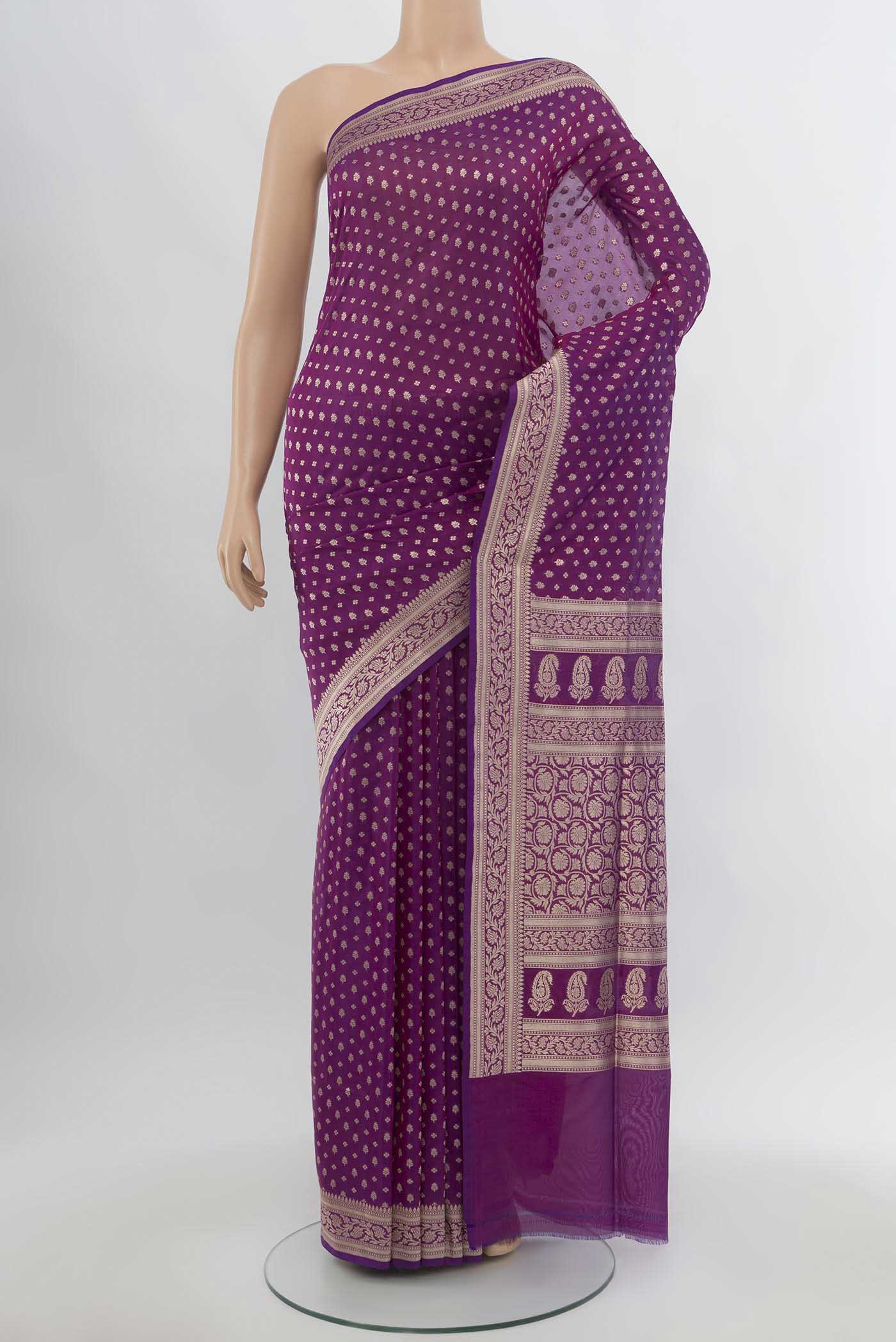 Purple Banarasi Katan Silk Saree with Zari Butta on the body and Silk Border.  displayed on a mannequin
