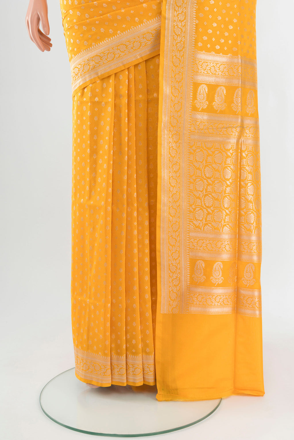 Pleats and pallu of Yellow Banarasi Silk Saree with Zari Butta on the body and Zari Border. 