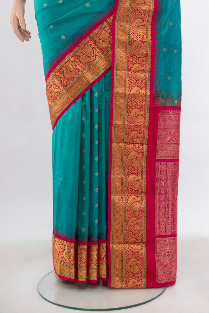Pleats and pallu of Light Blue Bangalore Silk Saree with Zari Butta on the body and Silk Border. 