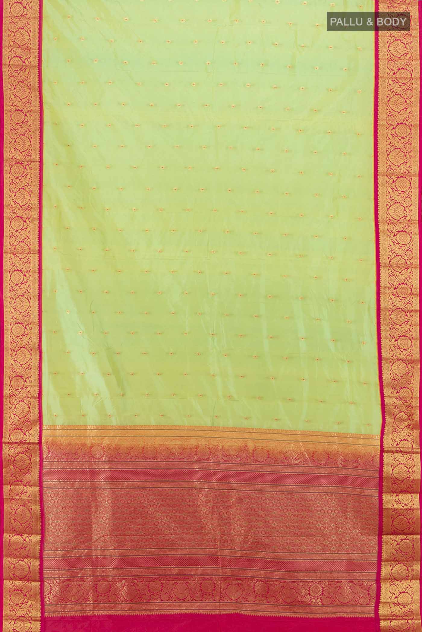 Flat view of Parrot Green Bangalore Silk Saree with Zari Butta on the body and Silk Border. 