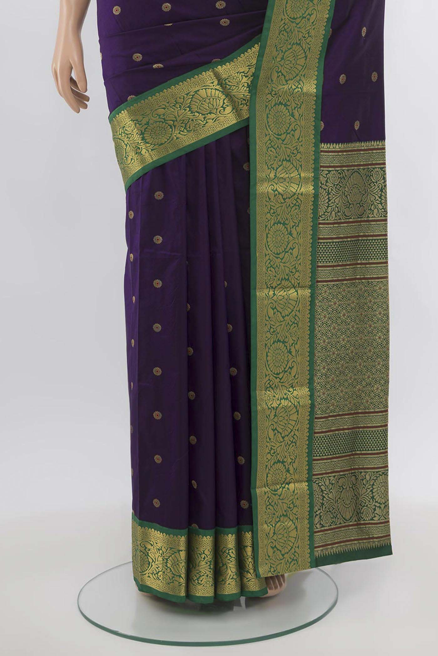 Pleats and pallu of Violet Bangalore Silk Saree with Zari Butta on the body and Silk Border. 