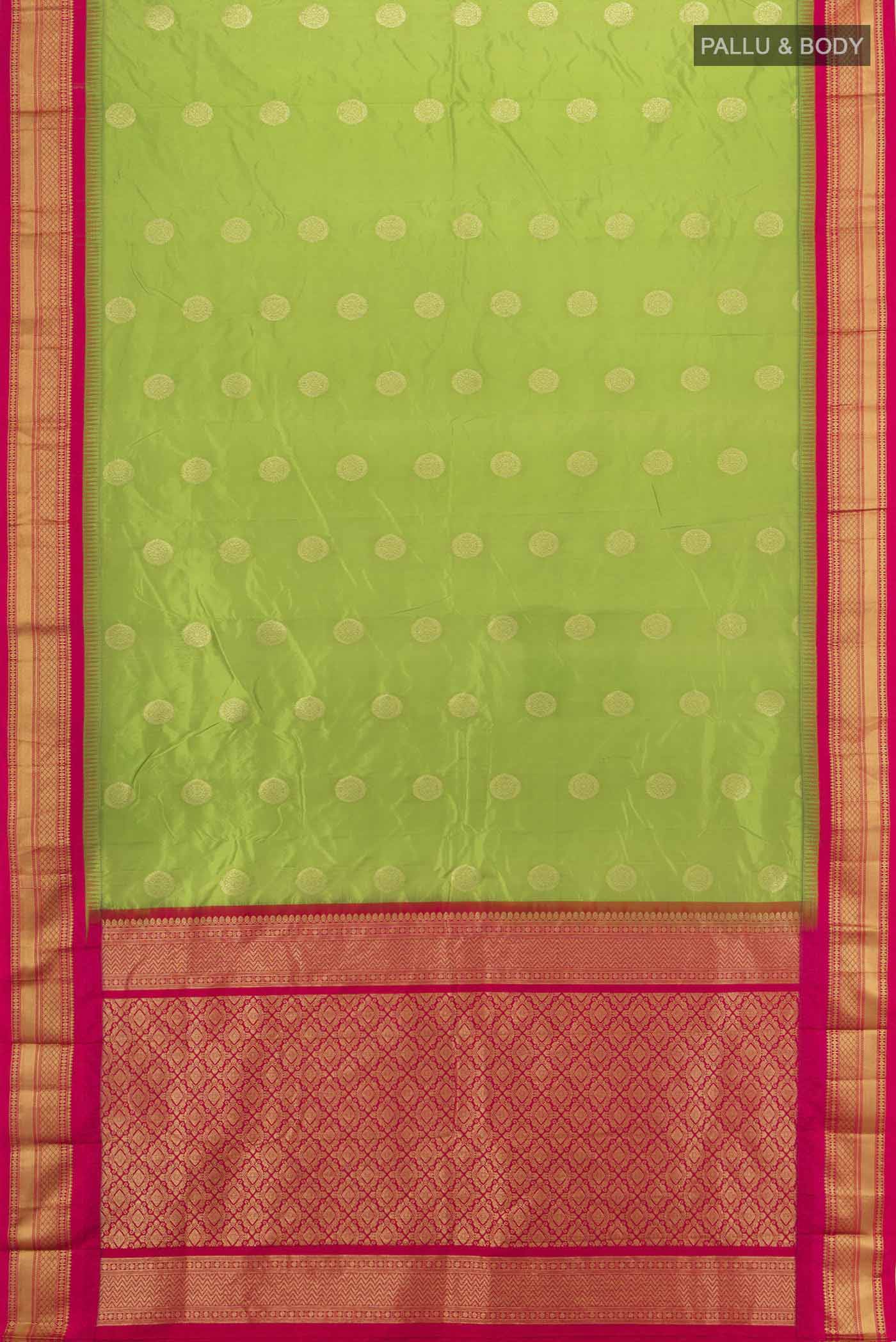 Flat view of Parrot Green Bangalore Silk Saree with Zari Butta on the body and Silk Border. 