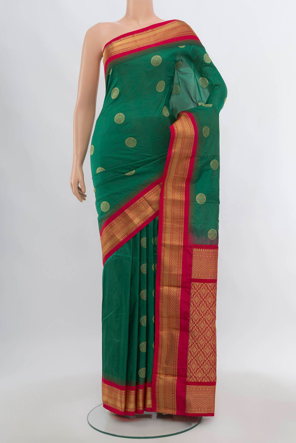 Light Green Bangalore Silk Saree with Zari Butta on the body and Silk Border.  displayed on a mannequin
