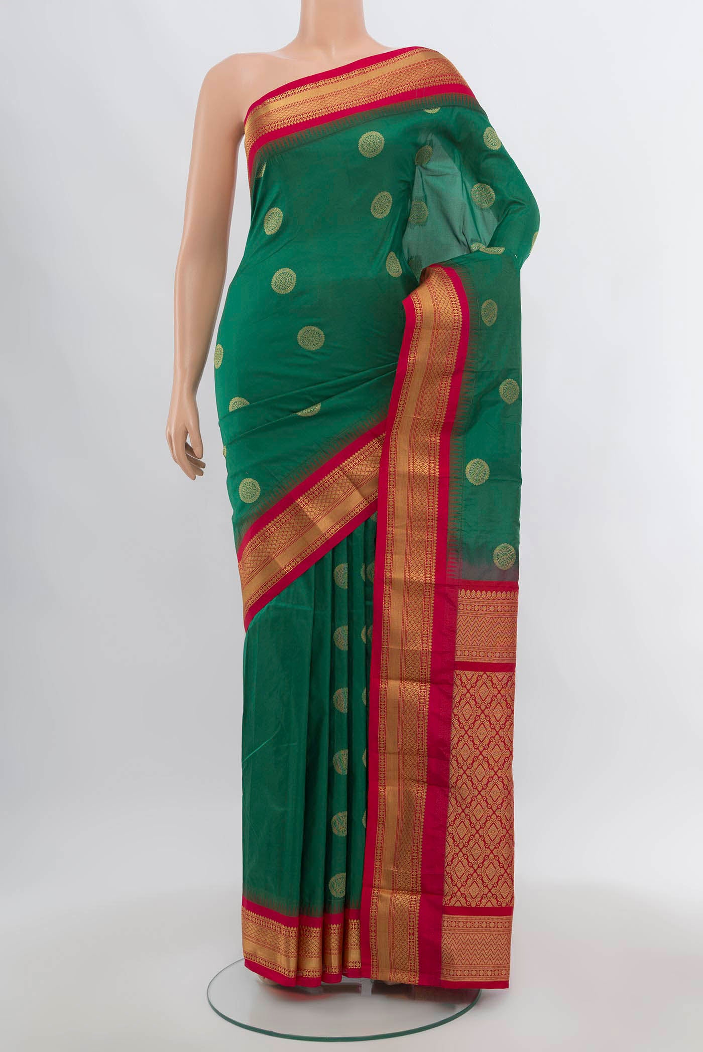 Light Green Bangalore Silk Saree with Zari Butta on the body and Silk Border.  displayed on a mannequin
