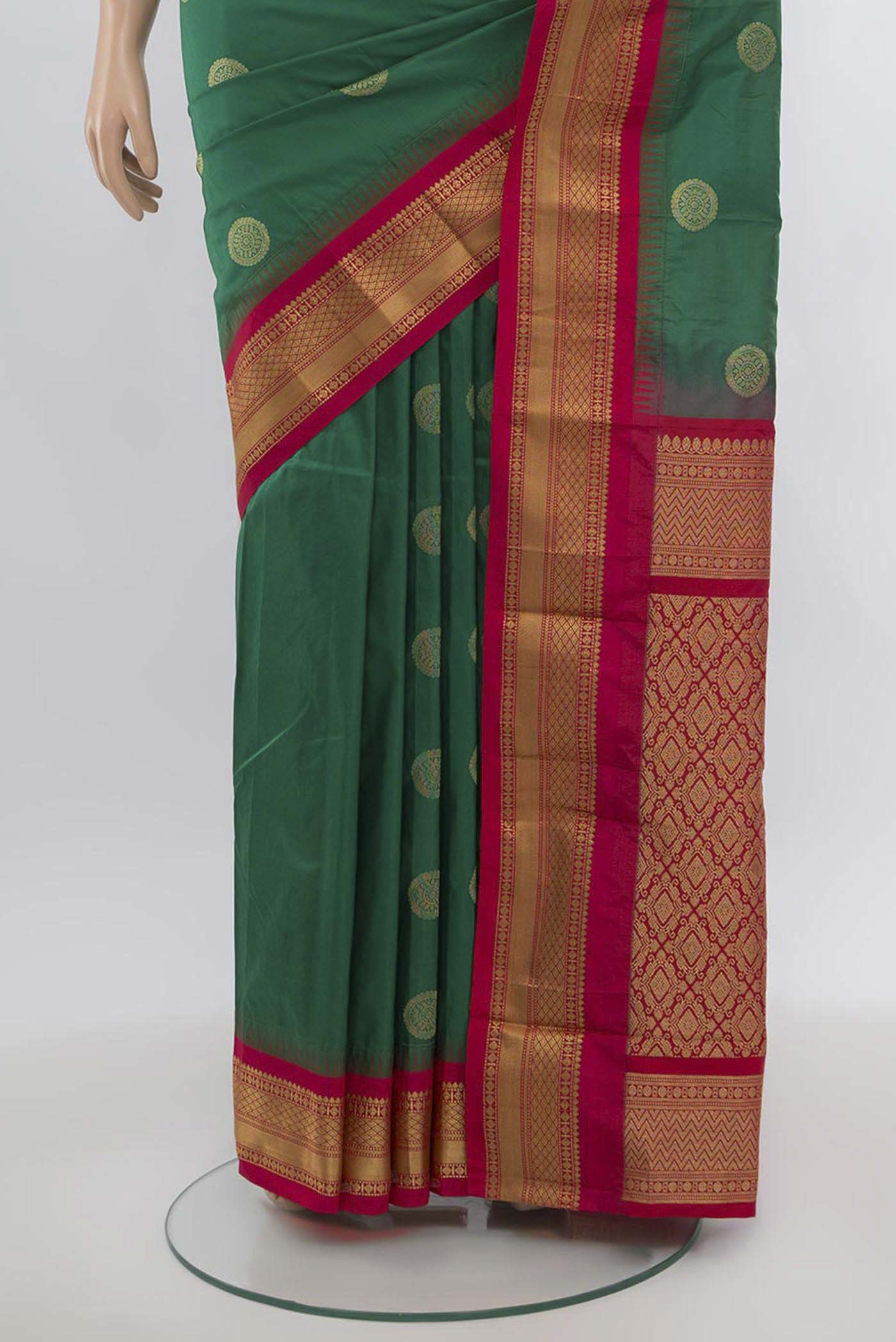 Pleats and pallu of Light Green Bangalore Silk Saree with Zari Butta on the body and Silk Border. 