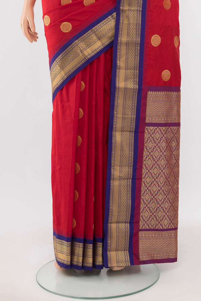 Pleats and pallu of Red Bangalore Silk Saree with Zari Butta on the body and Silk Border. 