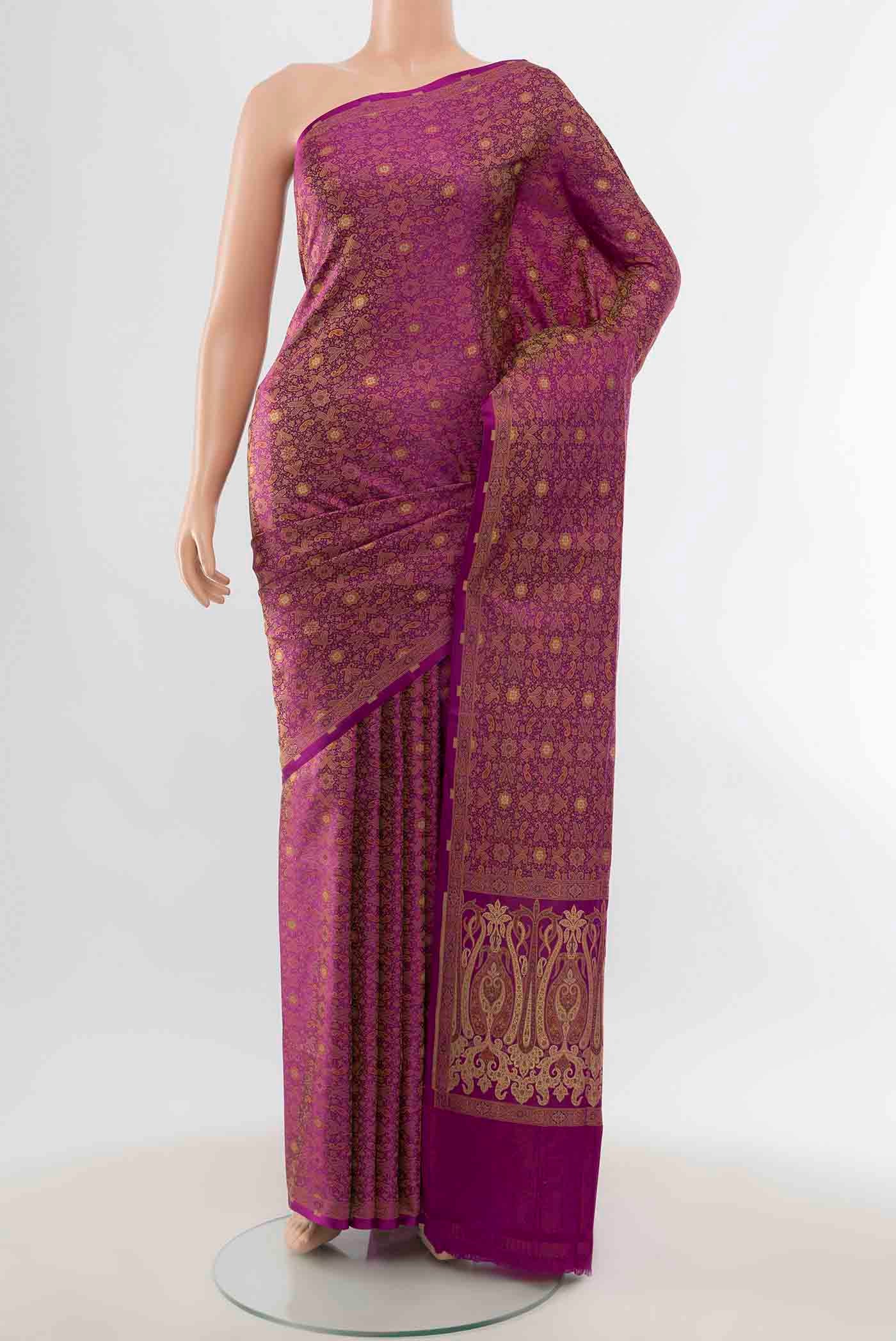 Purple Banarasi Silk Saree with Zari Butta on the body and Zari Border displayed on a mannequin