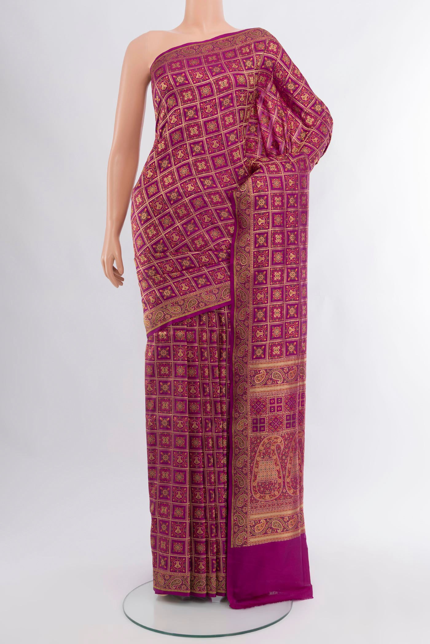 Purple Banarasi Silk Saree with Checked design on the body and Zari Border.  displayed on a mannequin