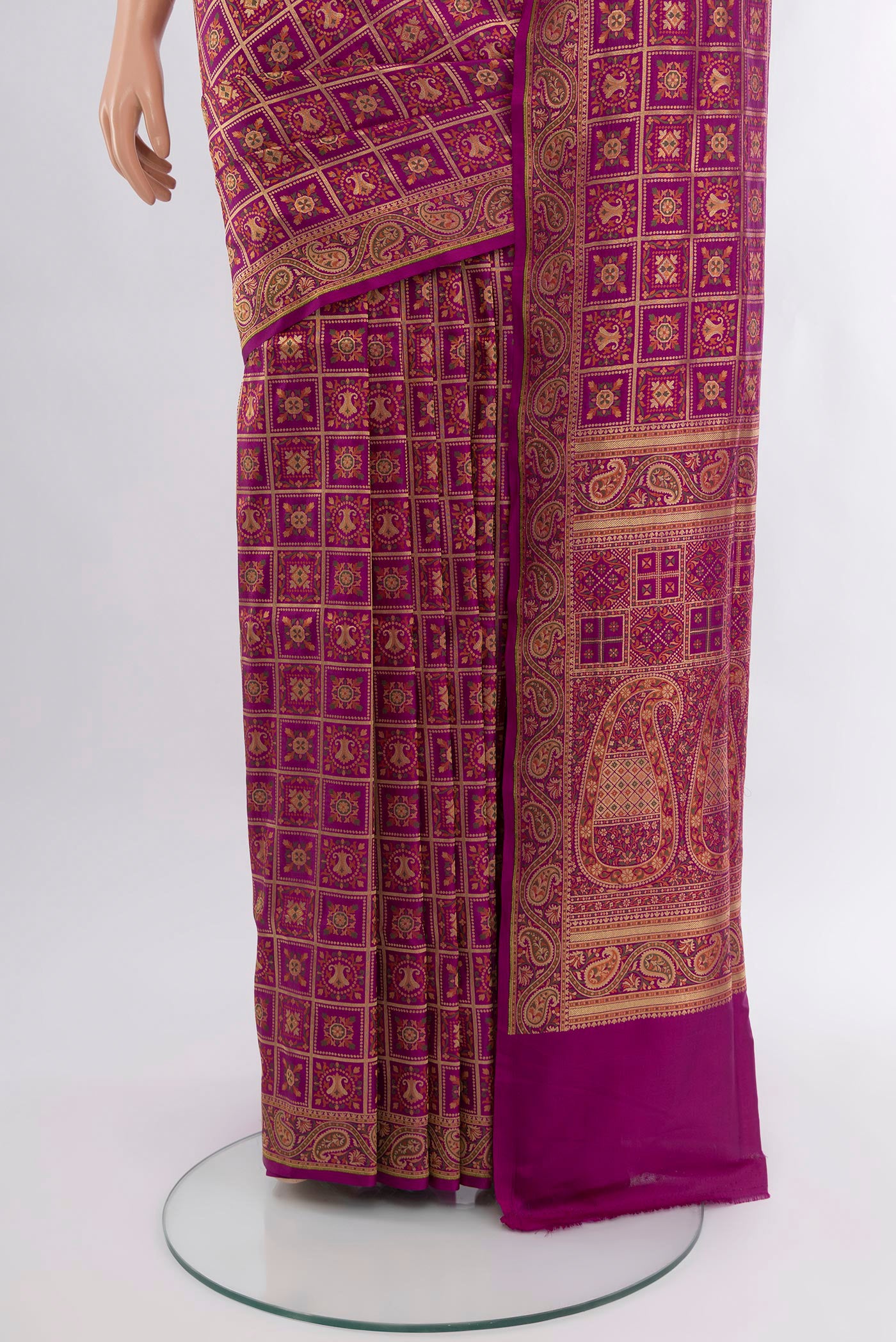 Pleats and pallu of Purple Banarasi Silk Saree with Checked design on the body and Zari Border. 