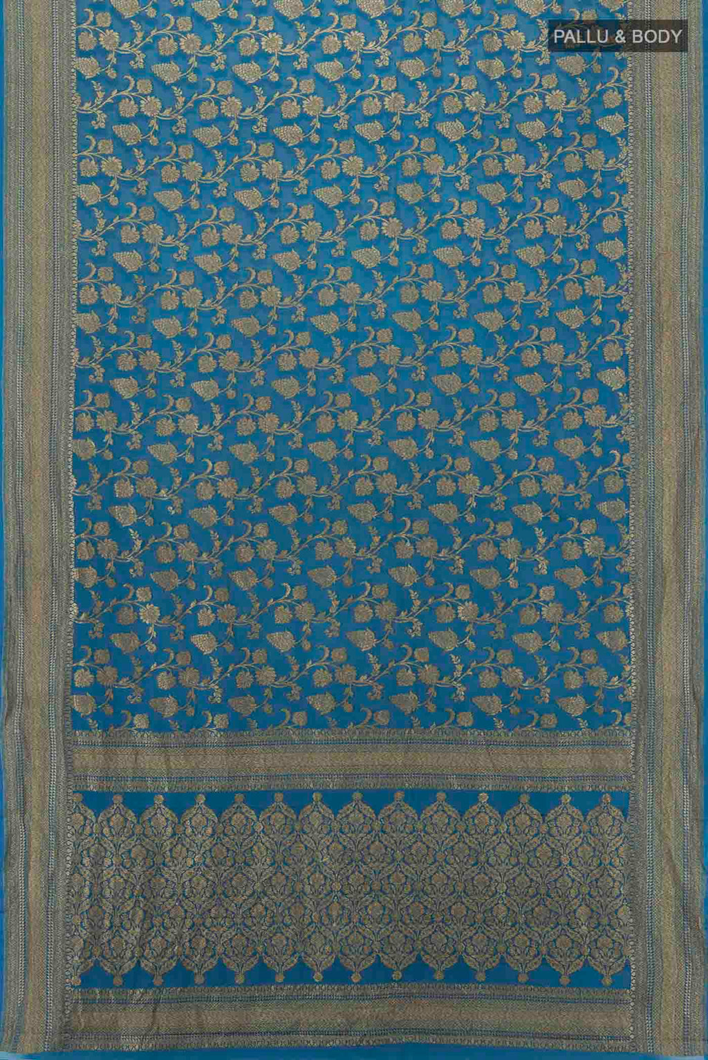 Flat view of Light Blue Banarasi Georgette Saree with Zari Butta on the body and Silk Border. 