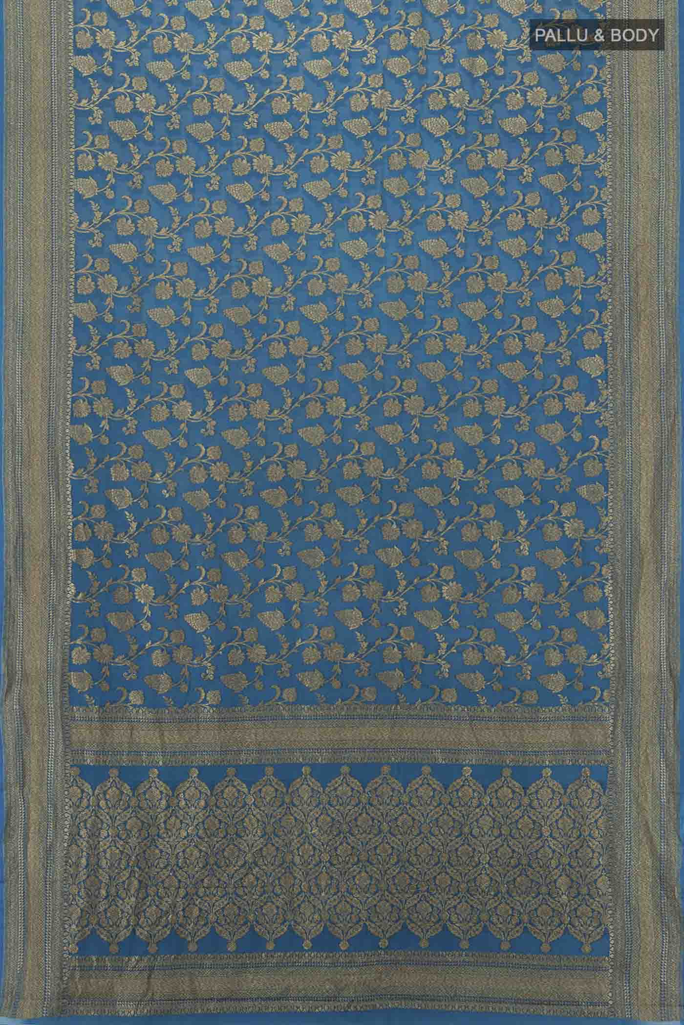 Flat view of Light Blue Banarasi Georgette Saree with Zari Butta on the body and Silk Border. 