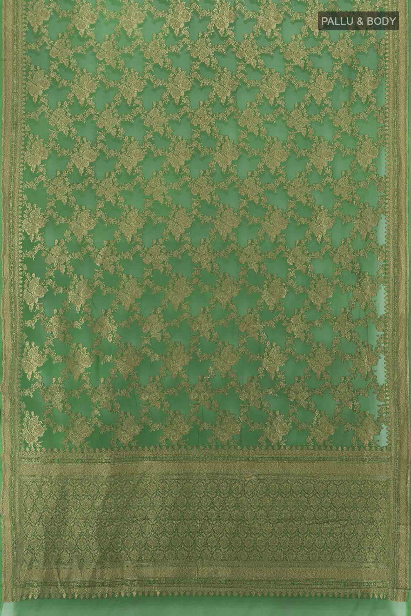 Flat view of Green Banarasi Georgette Saree with Zari Butta on the body and Silk Border. 