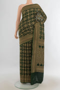 Sea Green Banarasi Georgette Saree with Zari Butta on the body and Silk Border.  displayed on a mannequin