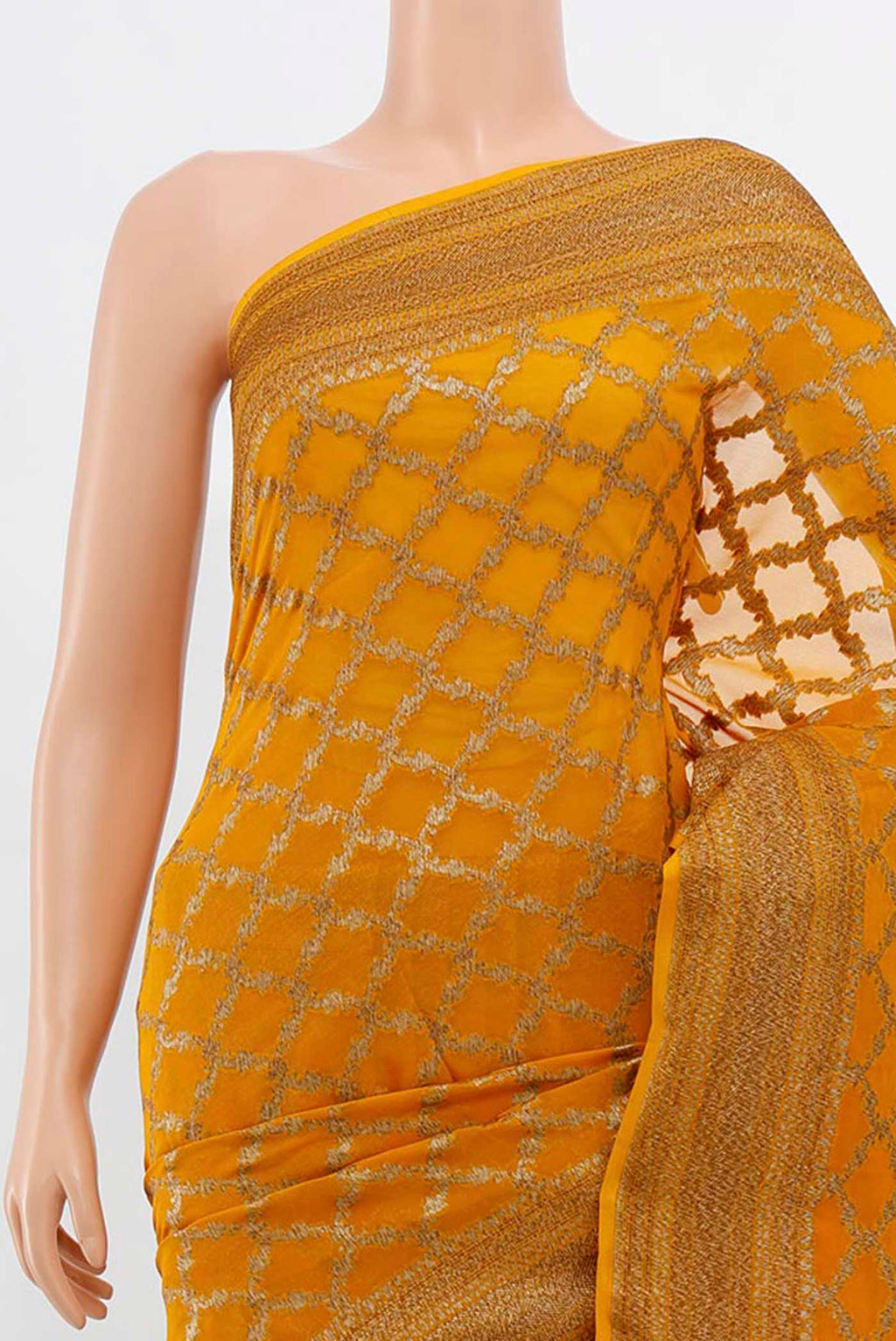 Border image of Mustard Banarasi Georgette Saree with Zari Butta on the body and Silk Border. 