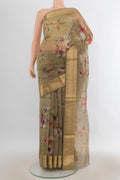 Green Organza Saree with Floral Print on the body and Zari Border.  displayed on a mannequin