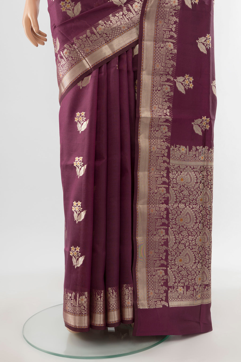 Pleats and pallu of Pure Silk Pure Zari Teal Banarasi Raw Saree with Zari Butta on the body and Silk Border. 
