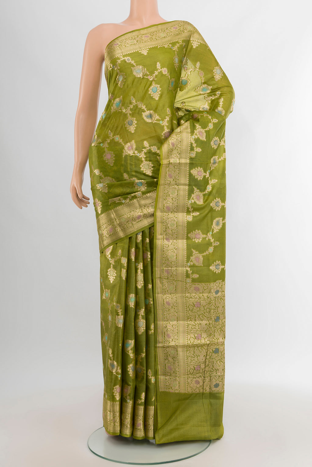 Light Green Banarasi Tussar Silk Saree with Zari And Thread Butta on the body and Zari Border.  displayed on a mannequin