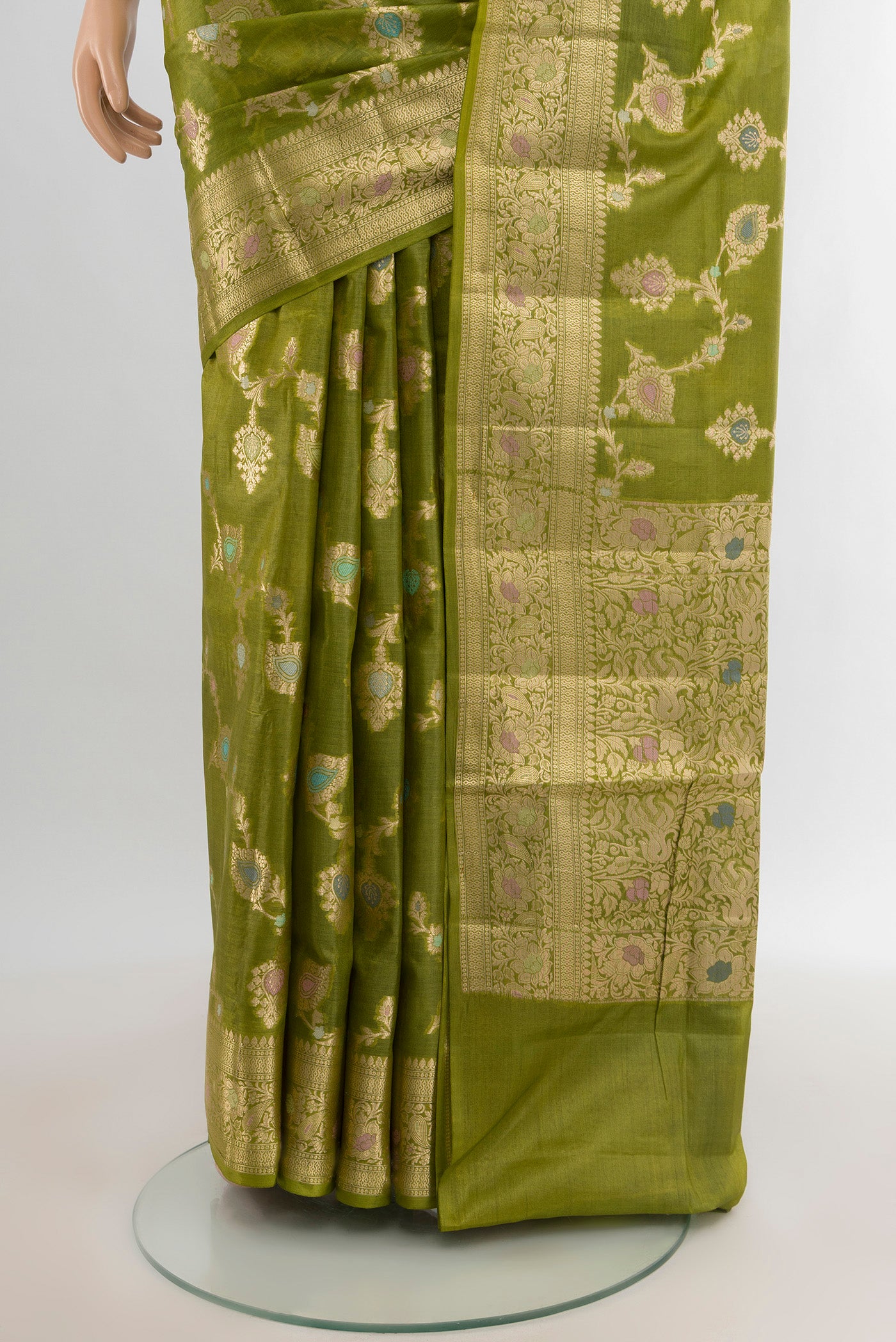 Pleats and pallu of Light Green Banarasi Tussar Silk Saree with Zari And Thread Butta on the body and Zari Border. 