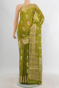 Light Green Banarasi Tussar Silk Saree with Zari Butta on the body and Zari Border.  displayed on a mannequin