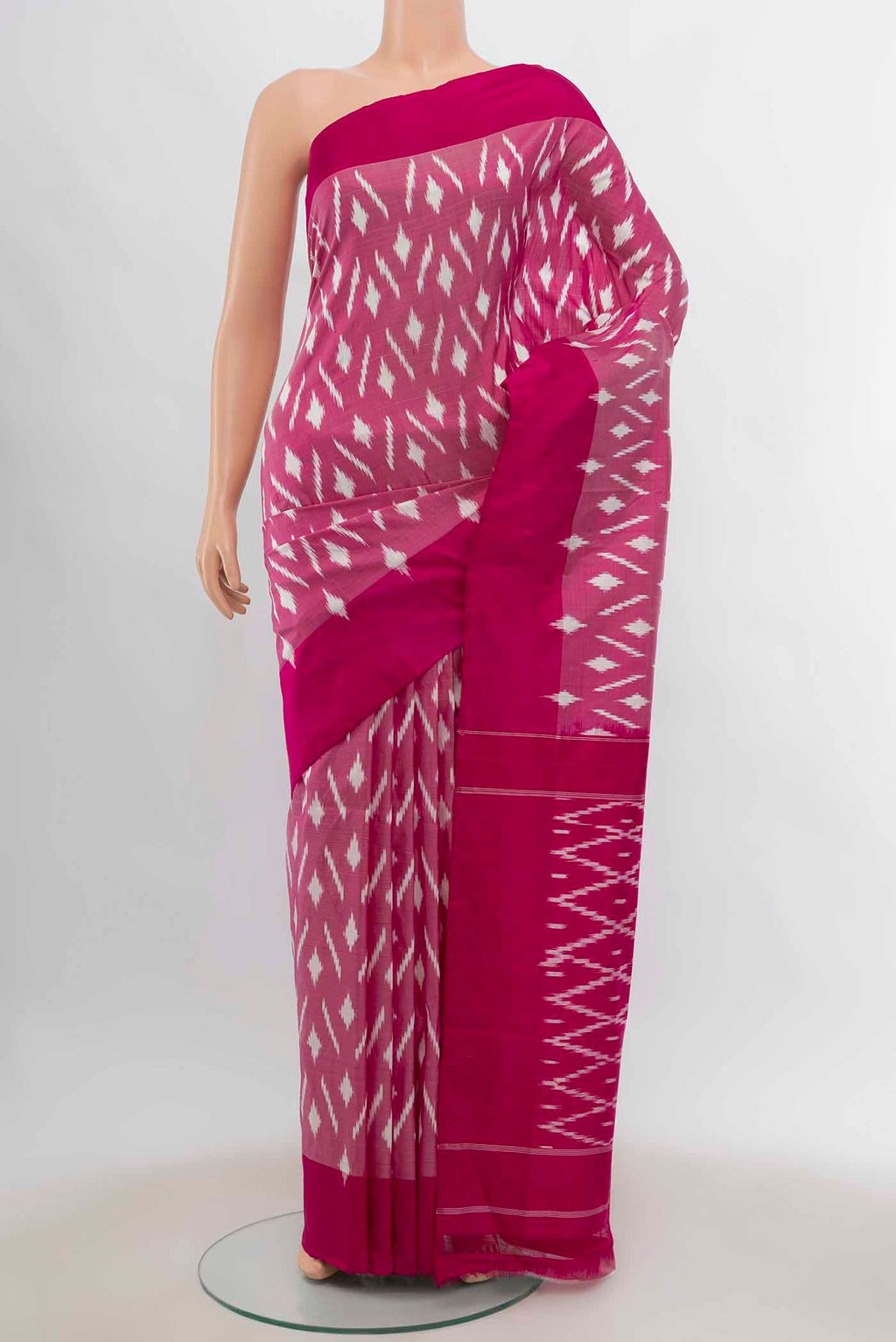 Pink Pochampally Silk Saree with Pure Ikat on the body and Ikat Border displayed on a mannequin