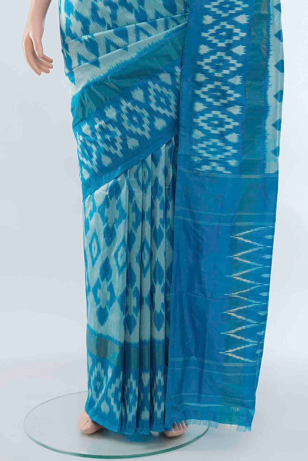 Pleats and pallu of Light Blue Pochampally Saree with Zari Butta on the body and Zari Border