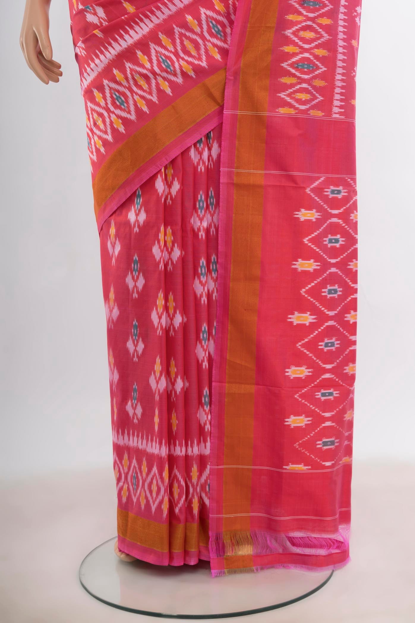 Pleats and pallu of Rose pink Pochampally Saree with Ikat Print on the body and Silk Border. 