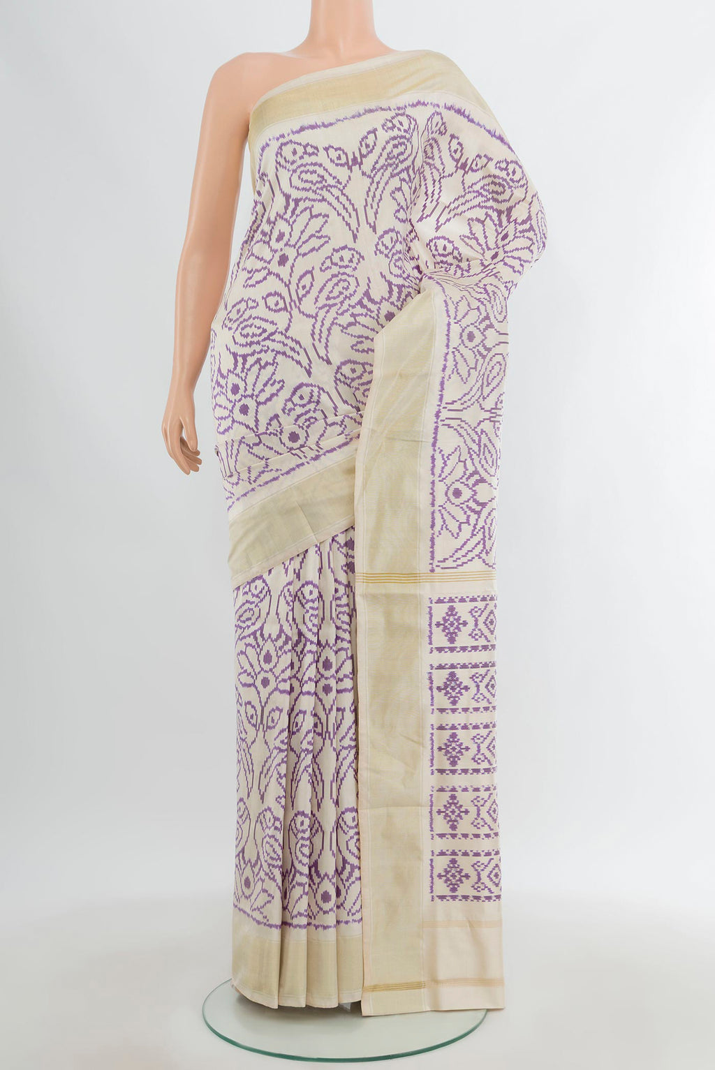 Off White Pochampally Silk Saree with Pure Ikat on the body and Plain Border.  displayed on a mannequin