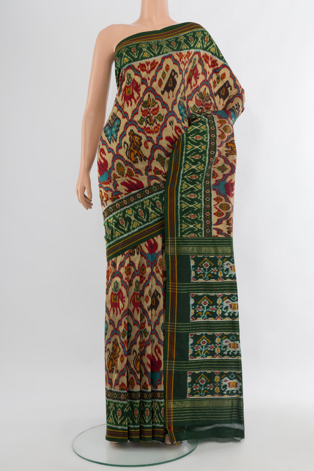 Multi Color Pochampally Silk Saree with Pure Ikat on the body and Ikat Border.  displayed on a mannequin