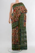 Multi Color Pochampally Silk Saree with Pure Ikat on the body and Ikat Border.  displayed on a mannequin