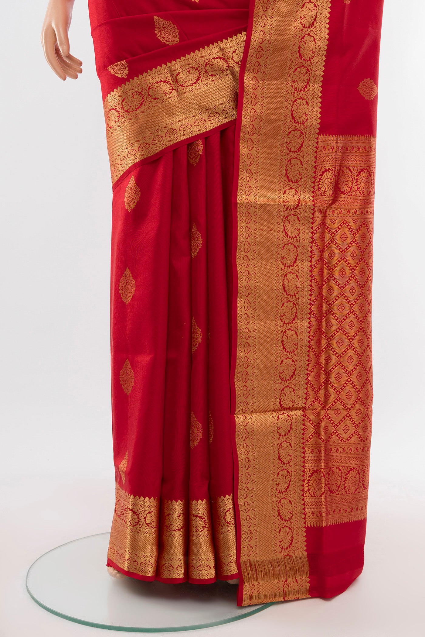 Pleats and pallu of Red Soft Silk Saree with Zari Butta on the body and Silk Border. 