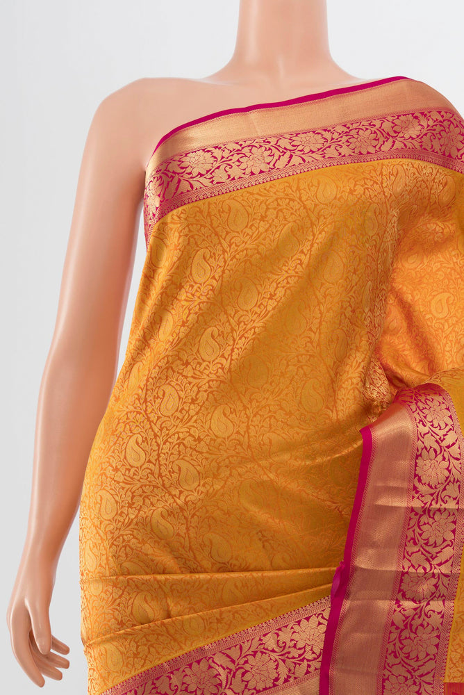 Border image of Golden Kanchipuram Silk Saree with Zari Butta on the body and Silk Border. 