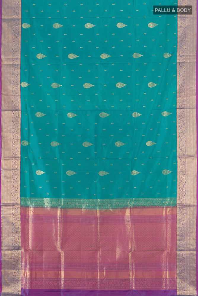 Flat view of Light Blue Soft Silk Saree with Zari Butta on the body and Silk Border. 