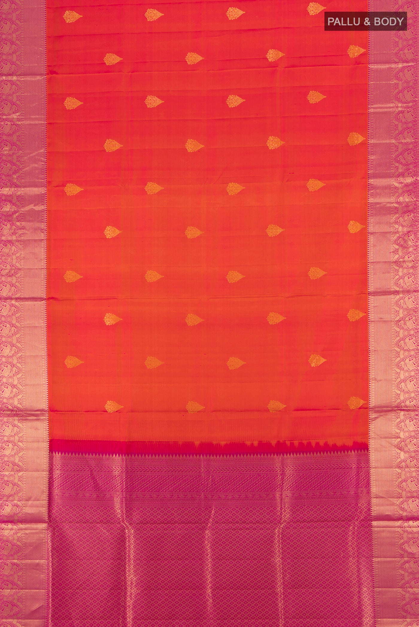 Flat view of Golden Peach Soft Silk Saree with Zari Butta on the body and Silk Border. 