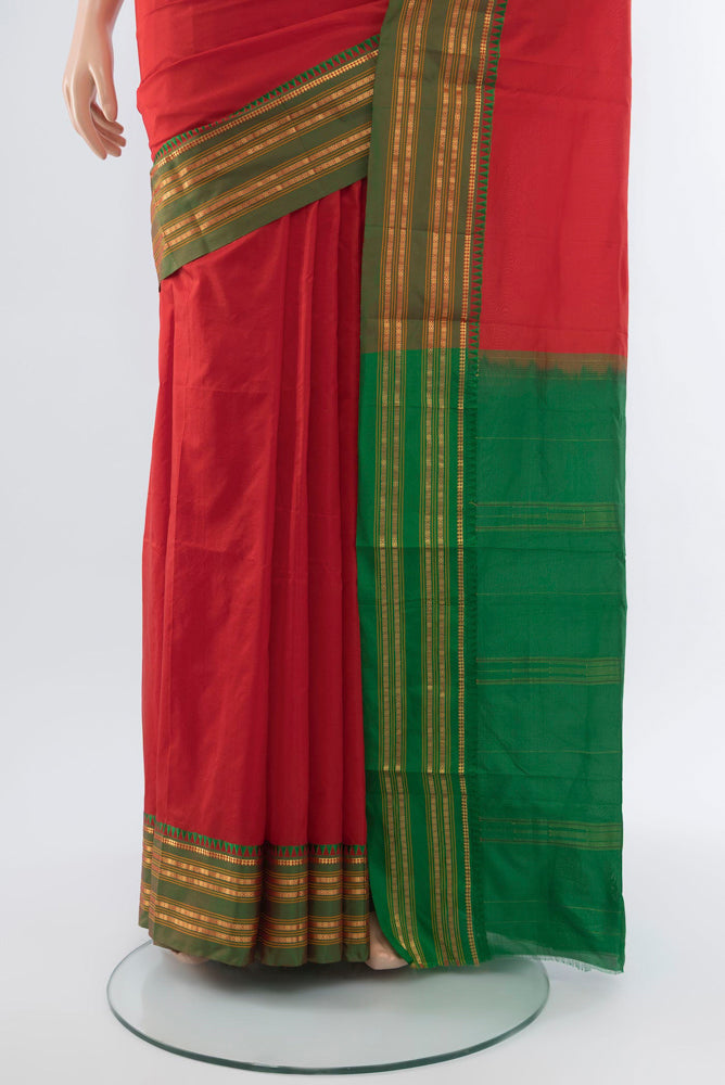 Pleats and pallu of Red Narayanpet Silk Saree with Plain Body and Silk Border. 