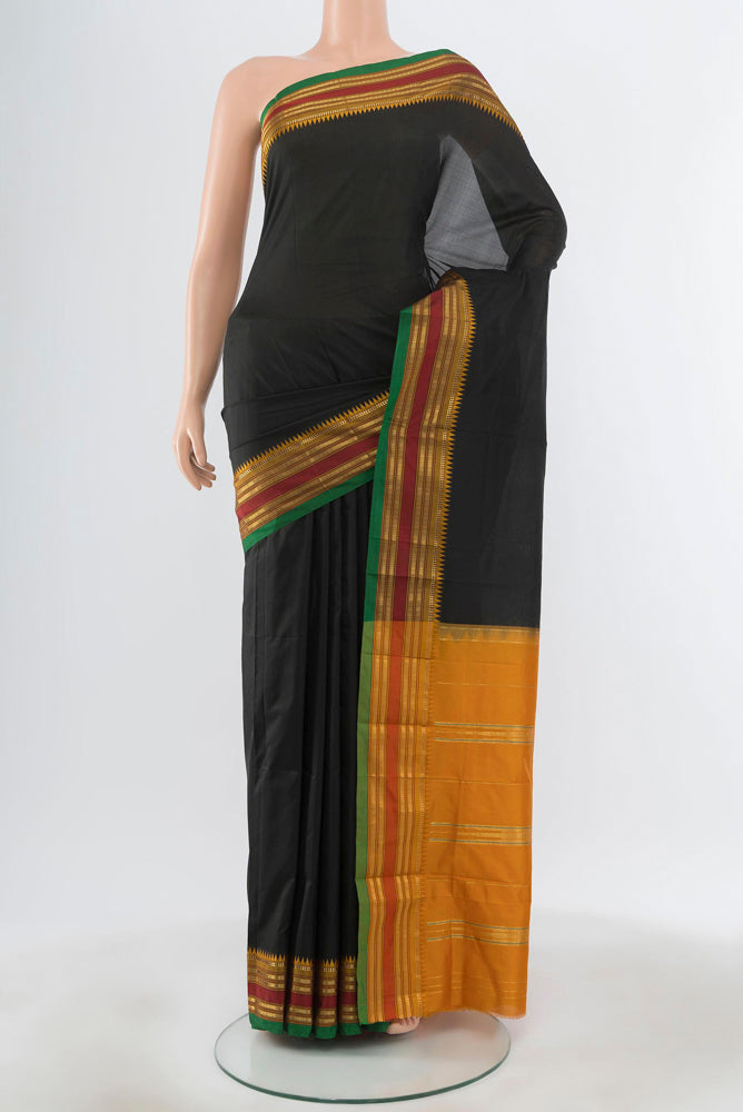 Pure Silk Pure Zari Black Narayanpet Saree with Plain Body and Silk Border.  displayed on a mannequin