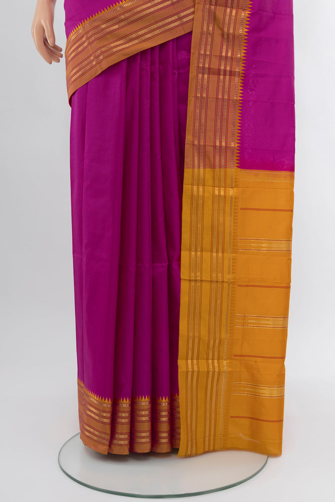 Pleats and pallu of Magenta Narayanpet Silk Saree with Zari Butta on the body and Silk Border. 