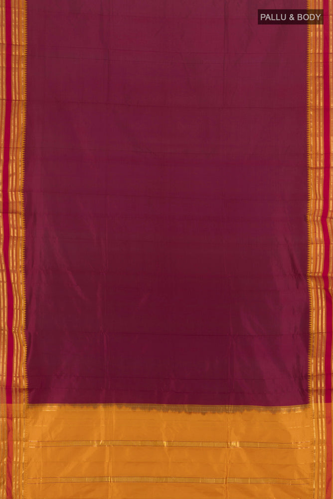 Flat view of Coffee Brown Rajkot Patola Silk Saree with Zari Butta on the body and Silk Border. 