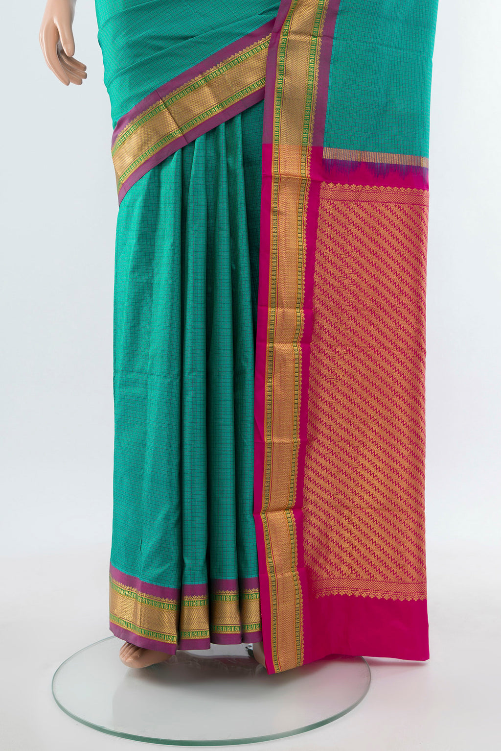 Pleats and pallu of Peacock Blue Narayanpet Silk Saree with Checked design on the body and Silk Border. 