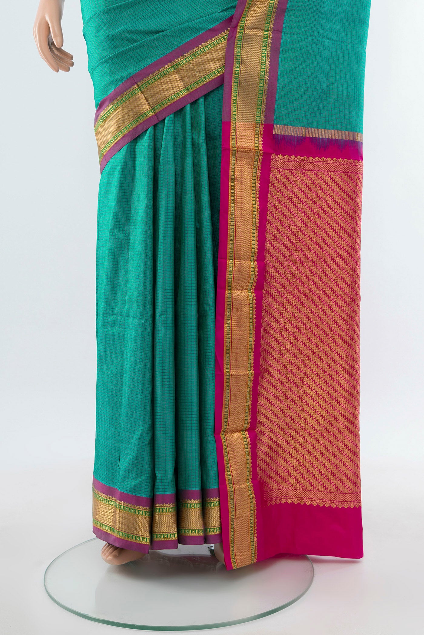 Pleats and pallu of Peacock Blue Narayanpet Silk Saree with Checked design on the body and Silk Border. 