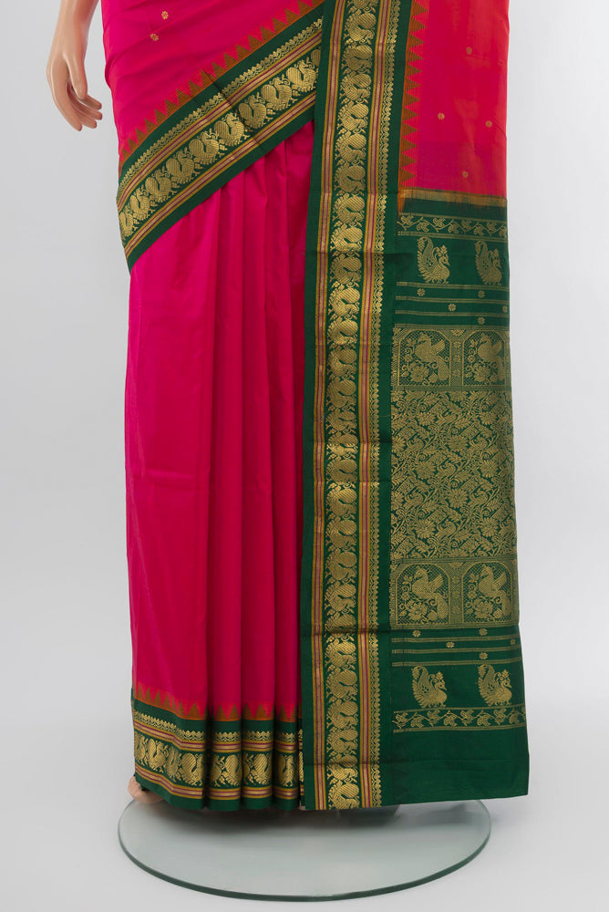 Pleats and pallu of Peach Narayanpet Silk Saree with Zari Butta on the body and Silk Border. 
